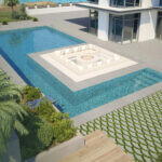 Jeffrey Court Scallop Porcelain Pavers and Pool Herringbone Mosaic installed in an outdoor pool