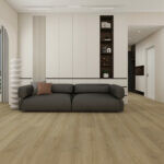 Locale 65 Ankara Amber SPC Luxury Vinyl Plank installed in an open concept living space with a couch